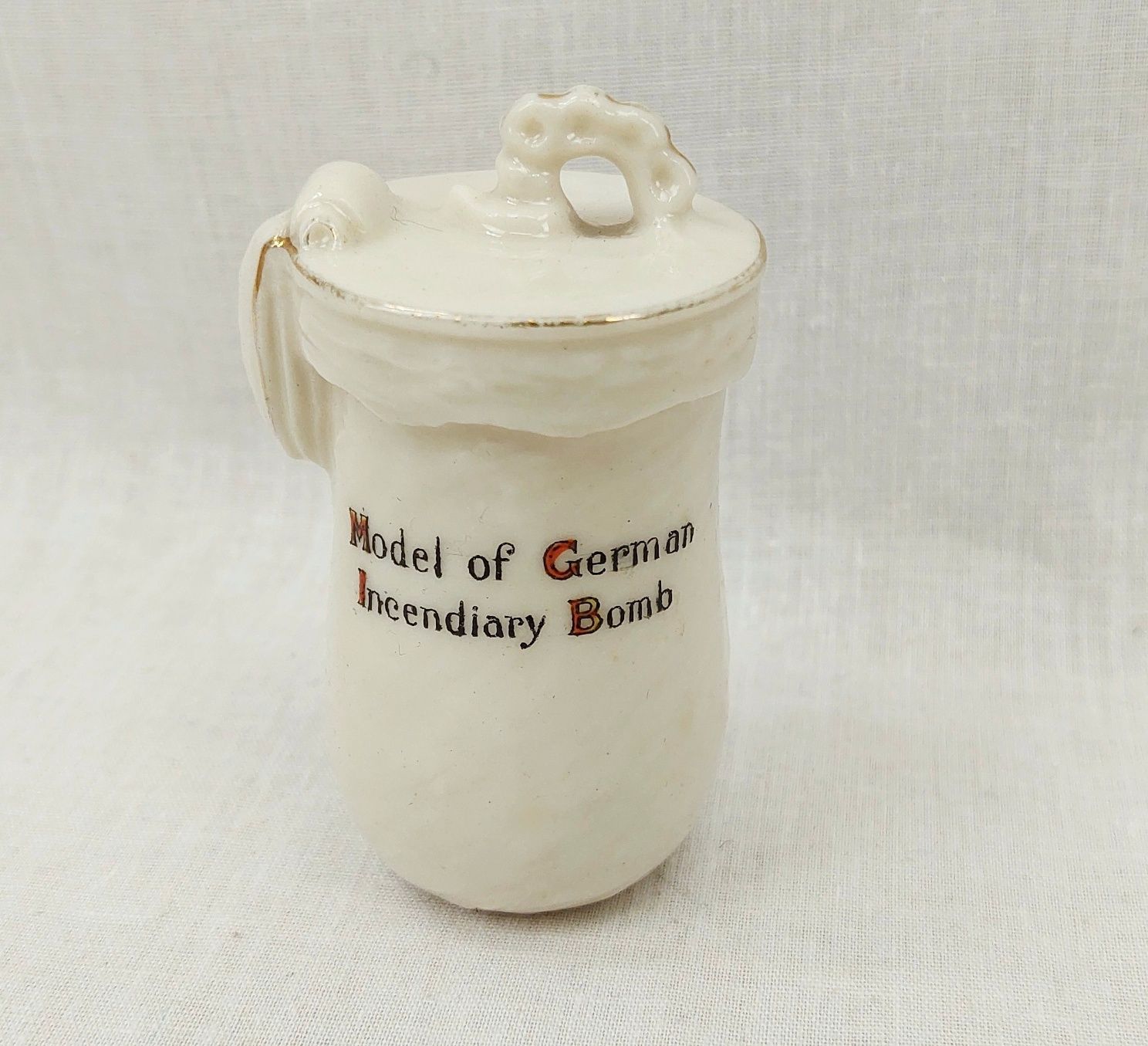 JA_4578205109 - WW1 Carlton Crested China Model of a German Incendiary Bomb - Putney (4)