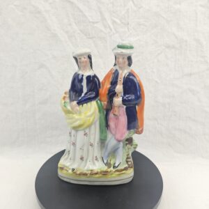 Victorian Staffordshire Figural Group of a Flautist and Flower Seller, c.1850–1870