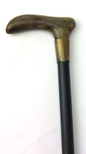 British or Colonial, Late 19th to Early 20th Century, Gentleman’s Swagger Stick with Horn Crook Handle and Brass Mounts